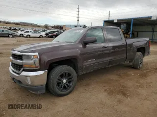 2016 Chevrolet Silverado 1500 LT with VIN 3GCUKREC9GG262656, listed as a Copart auction lot 44765435 with 112,940 mi miles and Salvage Title. Bid and sale history available at DreamBid. Image 1.