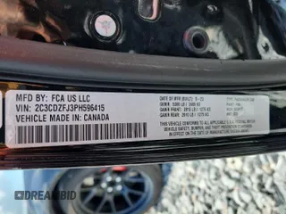 2023 Dodge Challenger R/T Scat Pack Widebody z VIN 2C3CDZFJ3PH596415, wystawiony jako Copart lot #61161035 z przebiegiem 10 317 mil mil oraz Szkoda całkowita • Salvage title. Historia ofert i sprzedaży dostępna na DreamBid. Obrazek 13.