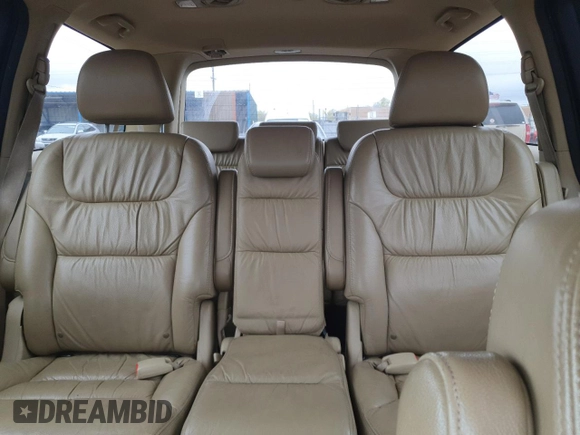 2008 Honda Odyssey EX-L z VIN 5FNRL38758B065246, wystawiony jako Copart lot #52621875 z przebiegiem 204 474 mil mil oraz Szkoda całkowita • Salvage title. Historia ofert i sprzedaży dostępna na DreamBid. Obrazek 10.