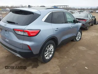 2022 Ford Escape SE Hybrid with VIN 1FMCU9BZ5NUB06831, listed as a IAAI auction lot 41747501 with 26,892 mi miles and . Bid and sale history available at carsss.com. Image 4.