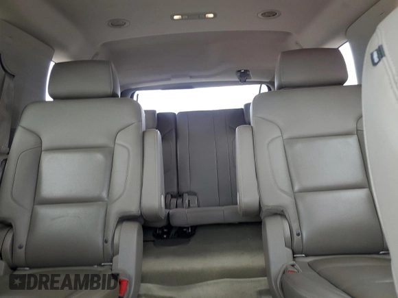 2015 Chevrolet Tahoe LTZ z VIN 1GNSCCKC0FR737641, wystawiony jako Copart lot #59797095 z przebiegiem 85 932 mil mil oraz Szkoda całkowita • Salvage title. Historia ofert i sprzedaży dostępna na DreamBid. Obrazek 10.