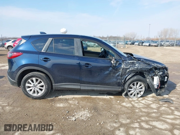 2015 Mazda CX-5 Touring with VIN JM3KE2CY0F0516589, listed as a IAAI auction lot 41707973 with 109,245 mi miles. Bid and sale history available at carsss.com. Image 13.