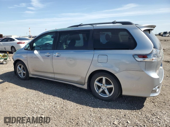 2014 Toyota Sienna SE with VIN 5TDXK3DC5ES454456, listed as a Copart auction lot 47098515 with 190,541 mi miles and Salvage Title. Bid and sale history available at DreamBid. Image 2.