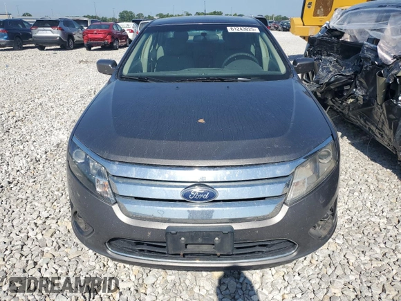 2012 Ford Fusion SE with VIN 3FAHP0HA1CR235996, listed as a Copart auction lot 61243025 with 165,218 mi miles and Salvage title. Bid and sale history available at DreamBid. Image 5.