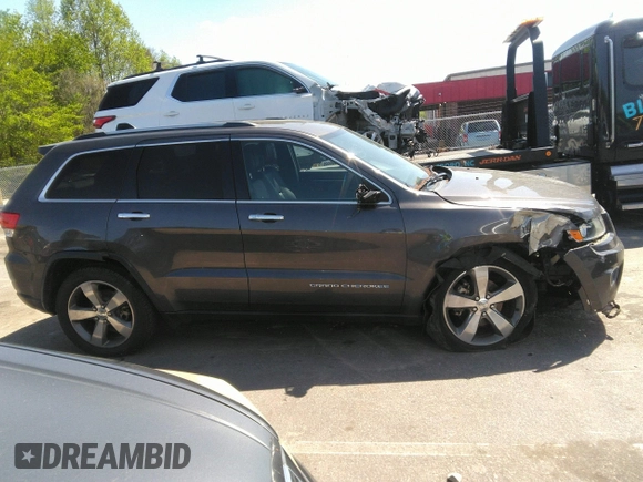2014 Jeep Grand Cherokee Limited with VIN 1C4RJEBG7EC482872, listed as a IAAI auction lot 41991274 with 125,343 mi miles and . Bid and sale history available at DreamBid. Image 14.