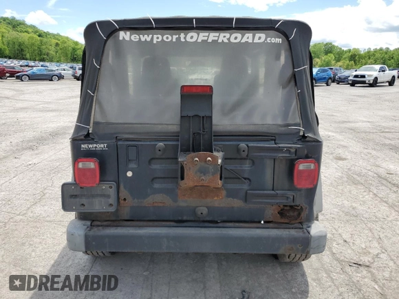 2004 Jeep Wrangler SE with VIN 1J4FA29124P796031, listed as a Copart auction lot 56875525 with 239,488 mi miles and Clean title. Bid and sale history available at DreamBid. Image 6.
