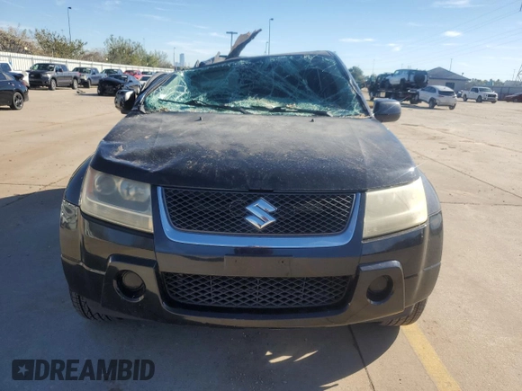 2007 Suzuki Grand Vitara z VIN JS3TE941X74202046, wystawiony jako Copart lot #80221394 z przebiegiem 153 791 mil mil oraz Szkoda całkowita • Salvage title. Historia ofert i sprzedaży dostępna na DreamBid. Obrazek 5.