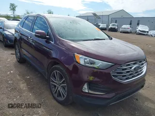2021 Ford Edge Titanium with VIN 2FMPK4K99MBA41965, listed as a IAAI auction lot 42114607 with 87,848 mi miles and . Bid and sale history available at DreamBid. Image 1.