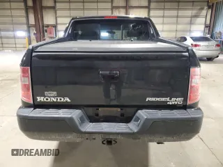 2010 Honda Ridgeline RTL with VIN 5FPYK1F5XAB011944, listed as a Copart auction lot 52434175 with 137,585 mi miles and Salvage title. Bid and sale history available at DreamBid. Image 6.