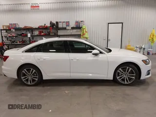 2023 Audi A6 Premium z VIN WAUD3BF24PN043215, wystawiony jako IAAI lot #42344302 z przebiegiem 55 357 mil mil oraz . Historia ofert i sprzedaży dostępna na DreamBid. Obrazek 12.