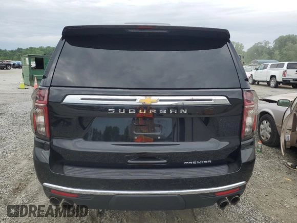 2023 Chevrolet Suburban Premier with VIN 1GNSCFKD4PR467132, listed as a Copart auction lot 57765515 with 25,934 mi miles and Clean title. Bid and sale history available at DreamBid. Image 6.