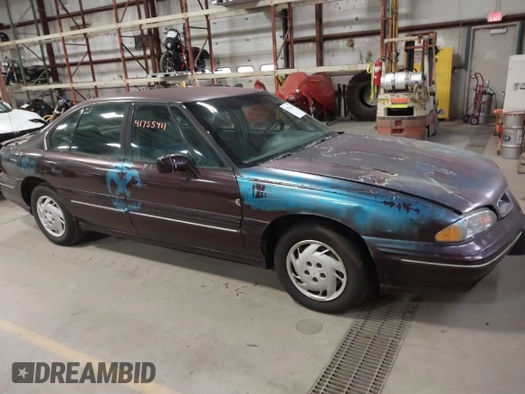 1999 Pontiac Bonneville SE z VIN 1G2HX52K2XH219410, wystawiony jako IAAI lot #41755411 z przebiegiem 187 752 mil mil oraz . Historia ofert i sprzedaży dostępna na DreamBid. Obrazek 1.