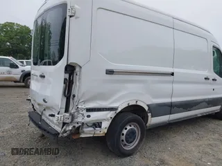 2015 Ford Transit Cargo with VIN 1FTNR2CM4FKA26975, listed as a IAAI auction lot 39407096 with 150,786 mi miles and . Bid and sale history available at carsss.com. Image 6.