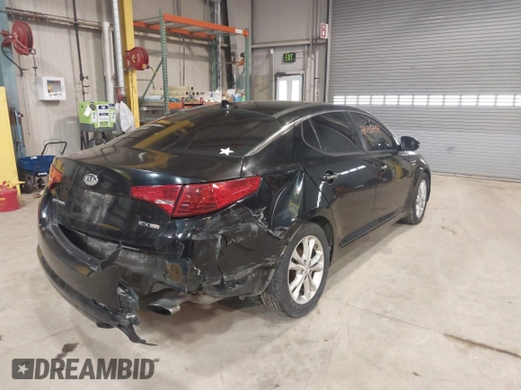 2013 Kia Optima EX z VIN 5XXGN4A77DG257728, wystawiony jako IAAI lot #41735459 z przebiegiem 262 740 mil mil oraz . Historia ofert i sprzedaży dostępna na DreamBid. Obrazek 6.