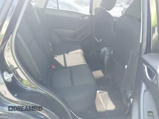 2014 Mazda CX-5 Sport z VIN JM3KE2BE2E0325715, wystawiony jako IAAI lot #42683243 z przebiegiem 262 005 mil mil oraz . Historia ofert i sprzedaży dostępna na DreamBid. Obrazek 8.