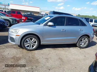 2017 Audi Q3 Premium with VIN WA1ECCFSXHR002623, listed as a IAAI auction lot 42077132 with 118,511 mi miles and . Bid and sale history available at DreamBid. Image 14.