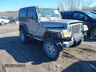 2002 Jeep Wrangler Sport with VIN 1J4FA49SX2P732367, listed as a IAAI auction lot 41805923 with 204,757 mi miles. Bid and sale history available at carsss.com. Image 1.