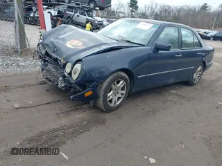 1999 Mercedes-Benz E-Class with VIN WDBJF82H3XX025608, listed as a IAAI auction lot 41606211 with 182,293 mi miles. Bid and sale history available at carsss.com. Image 2.