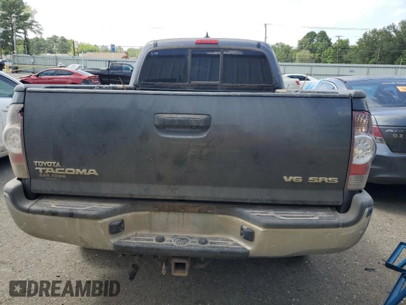 2014 Toyota Tacoma with VIN 5TFMU4FN3EX025697, listed as a Copart auction lot 62146895 with 133,028 mi miles and Salvage title. Bid and sale history available at DreamBid. Image 6.