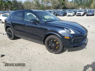 2023 Porsche Cayenne with VIN WP1AA2AY9PDA05586, listed as a Copart auction lot 54683355 with 11,370 mi miles and Salvage title. Bid and sale history available at DreamBid. Image 4.