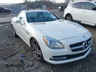 2014 Mercedes-Benz SLK 250 with VIN WDDPK4HA2EF085432, listed as a IAAI auction lot 41141812 with 65,718 mi miles and . Bid and sale history available at DreamBid. Image 1.