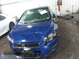 2014 Chevrolet Sonic LT with VIN 1G1JC5SG4E4136790, listed as a IAAI auction lot 37970640 with 180,252 mi miles and . Bid and sale history available at DreamBid. Image 12.