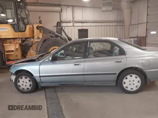 1996 Honda Accord LX with VIN 1HGCD563XTA141867, listed as a IAAI auction lot 41015252 with 420,800 mi miles and . Bid and sale history available at carsss.com. Image 14.