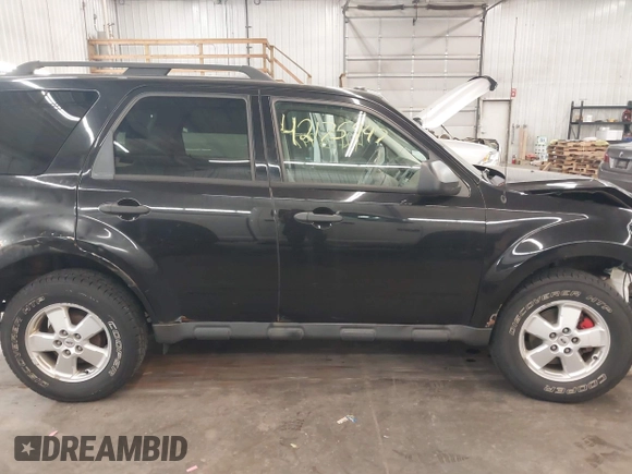 2011 Ford Escape XLT с VIN 1FMCU9DG9BKB14059, выставлен на аукционе IAAI как лот 42175947 с пробегом 113 901 миль миль и . История ставок и продаж доступна на DreamBid. Изображение 14.