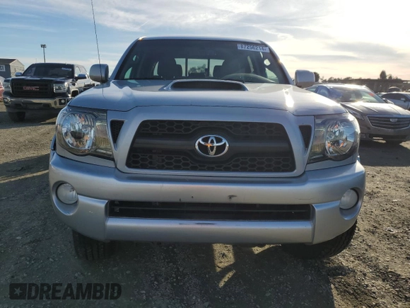 2011 Toyota Tacoma PreRunner with VIN 3TMJU4GN7BM114871, listed as a Copart auction lot 87256214 with 214,236 mi miles and Salvage Title. Bid and sale history available at DreamBid. Image 5.