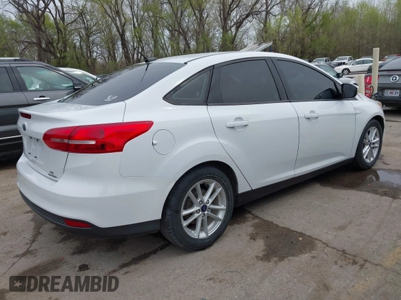 2016 Ford Focus SE with VIN 1FADP3F2XGL324613, listed as a IAAI auction lot 41971597 with 126,738 mi miles. Bid and sale history available at carsss.com. Image 4.