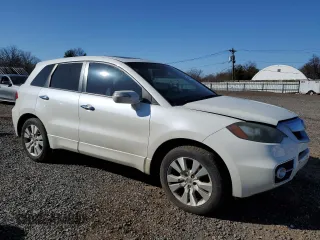 2011 Acura RDX z VIN 5J8TB1H2XBA003179, wystawiony jako Copart lot #48192945 z przebiegiem 130 468 mil mil oraz Szkoda całkowita • Salvage title. Historia ofert i sprzedaży dostępna na DreamBid. Obrazek 4.