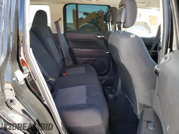 2015 Jeep Patriot Latitude with VIN 1C4NJPFB3FD377959, listed as a Copart auction lot 57914755 with 106,704 mi miles and Salvage title. Bid and sale history available at DreamBid. Image 11.