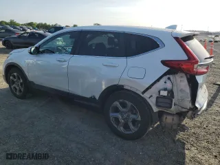 2018 Honda CR-V EX-L with VIN 2HKRW1H80JH516384, listed as a Copart auction lot 51940555 with 57,095 mi miles and Salvage Title. Bid and sale history available at carsss.com. Image 2.