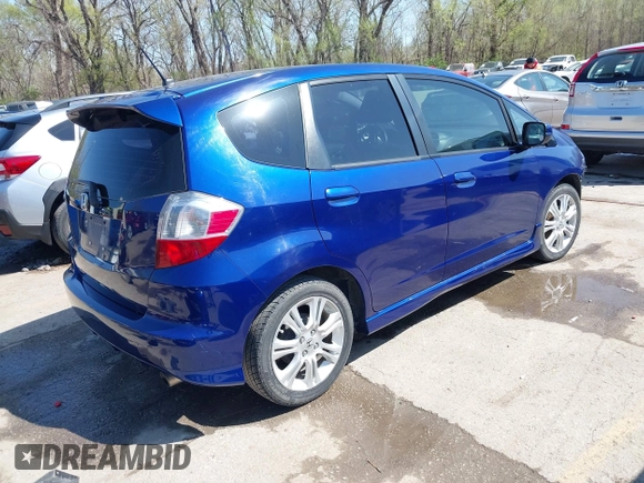 2010 Honda Fit Sport with VIN JHMGE8H4XAS018807, listed as a IAAI auction lot 41990369 with 63,151 mi miles. Bid and sale history available at carsss.com. Image 4.