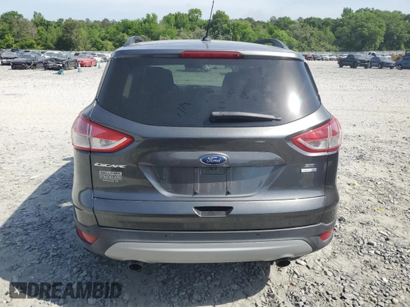 2016 Ford Escape SE with VIN 1FMCU9GX0GUC46005, listed as a Copart auction lot 53975955 with 124,994 mi miles and Salvage Title. Bid and sale history available at DreamBid. Image 6.