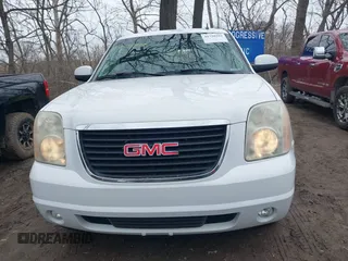 2007 GMC Yukon SLE with VIN 1GKFC13057R351385, listed as a IAAI auction lot 41720394 with 159,752 mi miles. Bid and sale history available at carsss.com. Image 13.