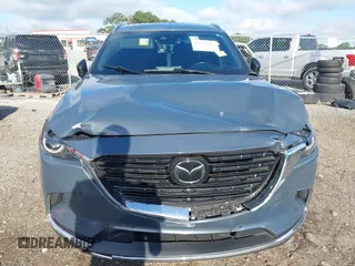 2021 Mazda CX-9 Grand Touring with VIN JM3TCADY7M0528223, listed as a IAAI auction lot 42395861 with 57,767 mi miles and . Bid and sale history available at DreamBid. Image 6.