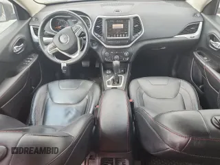 2014 Jeep Cherokee Trailhawk с VIN 1C4PJMBS1EW212024, выставлен на аукционе Copart как лот 58825265 с пробегом 99 087 миль миль и Списание • Salvage title. История ставок и продаж доступна на DreamBid. Изображение 8.
