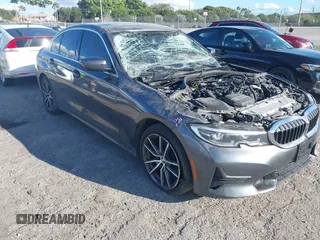 2021 BMW 3 Series 330i xDrive with VIN 3MW5R7J01M8B49173, listed as a IAAI auction lot 41672538 with 82,259 mi miles. Bid and sale history available at carsss.com. Image 1.