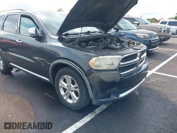 2011 Dodge Durango Crew with VIN 1D4RD4GG6BC651434, listed as a IAAI auction lot 42156389 with 505,373 mi miles and . Bid and sale history available at carsss.com. Image 6.