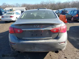 2015 Infiniti Q50 Premium with VIN JN1BV7AP4FM334762, listed as a IAAI auction lot 41443049 with 99,519 mi miles. Bid and sale history available at carsss.com. Image 17.