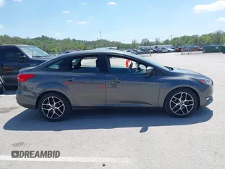 2018 Ford Focus SE z VIN 1FADP3FE6JL223294, wystawiony jako IAAI lot #42067973 z przebiegiem 74 734 mil mil oraz . Historia ofert i sprzedaży dostępna na DreamBid. Obrazek 13.