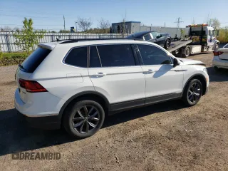 2022 Volkswagen Tiguan SE with VIN 3VV2B7AX9NM127634, listed as a Copart auction lot 55668325 with 47,734 mi miles and Salvage title. Bid and sale history available at DreamBid. Image 3.