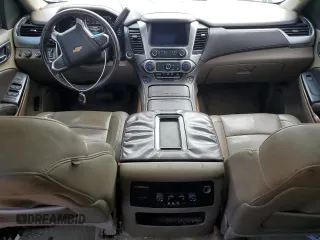 2015 Chevrolet Tahoe LTZ with VIN 1GNSKCKC1FR310018, listed as a Copart auction lot 71798454 with 244,179 mi miles and Salvage title. Bid and sale history available at DreamBid. Image 8.