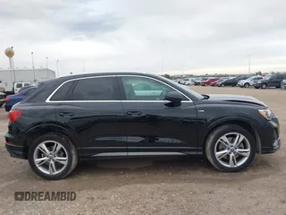 2020 Audi Q3 S line Premium z VIN WA1DECF34L1088002, wystawiony jako IAAI lot #41332352 z przebiegiem 41 196 mil mil oraz . Historia ofert i sprzedaży dostępna na DreamBid. Obrazek 13.