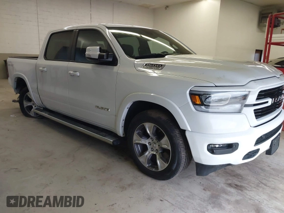 2021 Ram 1500 Laramie with VIN 1C6SRFJT6MN671456, listed as a IAAI auction lot 41087757 with 40,593 mi miles and . Bid and sale history available at DreamBid. Image 1.