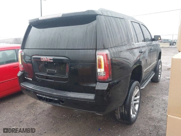 2017 GMC Yukon SLT with VIN 1GKS2BKC4HR189981, listed as a IAAI auction lot 41552723 with 208,161 mi miles. Bid and sale history available at carsss.com. Image 4.