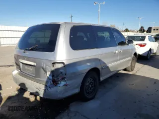 2003 Kia Sedona LX with VIN KNDUP131236371153, listed as a Copart auction lot 80989974 with 205,181 mi miles and Salvage Title. Bid and sale history available at carsss.com. Image 3.
