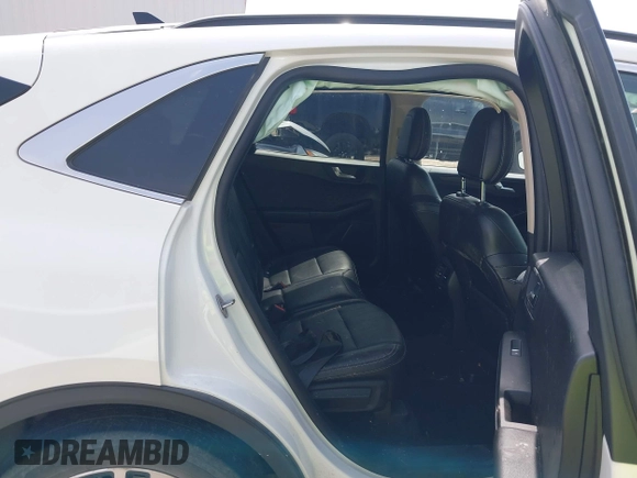 2020 Ford Escape Titanium Hybrid with VIN 1FMCU0DZ9LUA54867, listed as a IAAI auction lot 42268245 with 68,974 mi miles and . Bid and sale history available at DreamBid. Image 8.