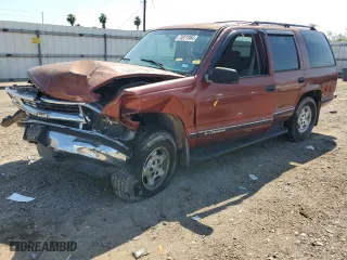 1999 Chevrolet Tahoe Z71 with VIN 1GNEK13R0XJ474557, listed as a Copart auction lot 74971964 with 217,027 mi miles and Salvage Title. Bid and sale history available at carsss.com. Image 1.